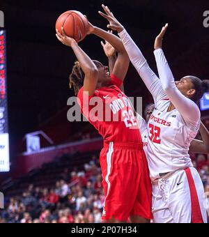 Rutgers' guard/forward Kandiss Barber (22) gets pressure from Ohio State's  forward Alexa Hart (22) at the Louis Brown Athletic Center in Piscataway,  New Jersey. The Ohio State Buckeyes defeated Rutgers Scarlet Knights