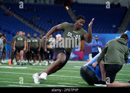 Wisconsin defensive lineman Keeanu Benton runs the 40-yard dash at the ...