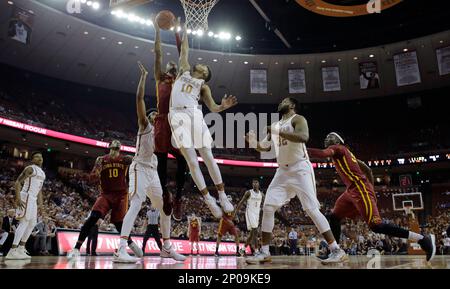 NORMAN, OK - FEBRUARY 17: Texas Longhorns Guard Eric Davis (10) during a  college basketball game between the Oklahoma Sooners and the Texas  Longhorns on February 17, 2018, at the Lloyd Noble