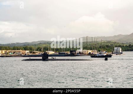 NAVAL BASE GUAM (Jan. 17, 2023) – The Los Angeles-class fast-attack submarine USS Key West (SSN 722) departs Naval Base Guam, Jan. 17. Key West is one of five submarines assigned to Commander, Submarine Squadron 15. Commander, Submarine Squadron 15 is responsible for providing training, material and personnel readiness support to multiple Los Angeles-class fast attack submarines and is located at Polaris Point, Naval Base Guam. (U.S. Navy photo by Lt. Eric Uhden) Stock Photo