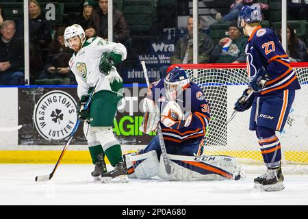 Everett Silvertips forward Cal Babych (77) turns with the puck versus the Seattle  Thunderbirds during Game 2 of the WHL Western Conference Semifinals on  Saturday, Apr. 8, 2017 at Xfinity Arena in