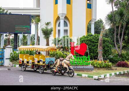 Surabaya Indonesia 25th Dec 2022: the carriage outside of Al-Akbar Mosque (Masjid Al-Akbar).  It is the second largest mosque in Indonesia. Stock Photo