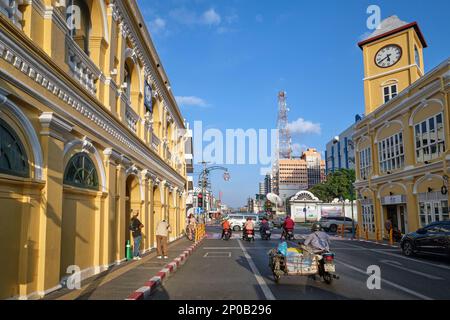 The old Standard Chartered Bank bldg. (l) and clocktower in the Old Town area of Phuket Town, Phuket, Thailand, the former now housing a museum Stock Photo