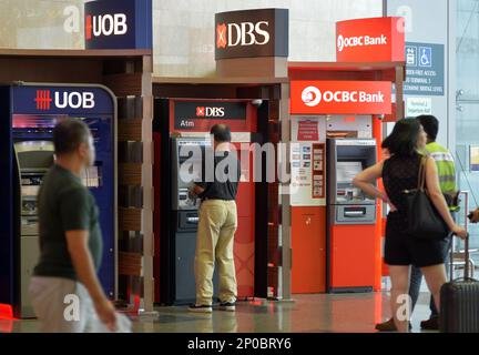 ATM machines from UOB, DBS and OCBC Bank, at Changi Airport terminal 2 ...