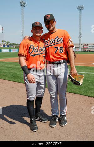 Lakeland, USA. 02nd Mar, 2022. Lakeland FL USA; Baltimore Orioles second  baseman Terrin Vavra (77) and outfielder Colton Bowser (76) stop to pose  for a photo during pregame warmups prior to an