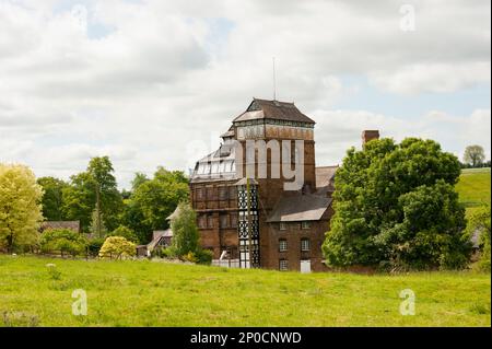 A traditional Victorian tower brewery, the Hook Norton Brewery still uses the original building, constructed  in 1849 Stock Photo