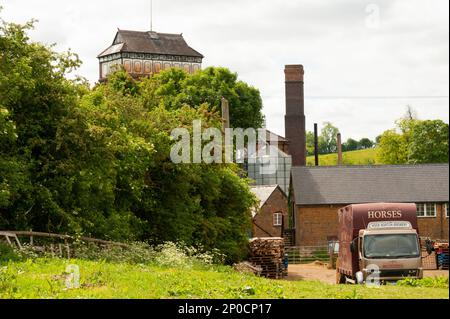 A traditional Victorian tower brewery, the Hook Norton Brewery still uses the original building, constructed  in 1849 Stock Photo