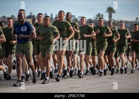 New U.S. Marines with Lima Company, 3rd Recruit Training Battalion, conduct the motivational run at Marine Corps Recruit Depot San Diego, Jan. 12, 2023. The motivational run was the last physical fitness event conducted in recruit training. Stock Photo