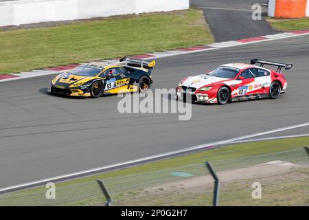 Lamborghini Huracan Super Trofeo, BMW M6 GT3, overtaking, overtaking, 24h Nuerburgring race track, 24 Hours of Nuerburgring 2017, motorsport Stock Photo