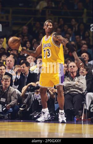 Dennis Rodman of the Los Angeles Lakers reacts to a play during a