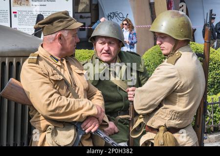 Reenactors in uniforms of Polish military, before reenactment of WW2 battle, City Hall Square in Jelenia Góra, Lower Silesia, Poland Stock Photo