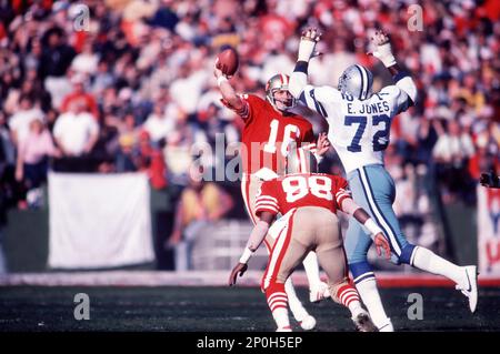 Dallas Cowboys Ed Too Tall Jones talks with the Houston Oilers Earl  Campbell after the game. Football has taken a toll on the body of the  former running back. (Photo by File