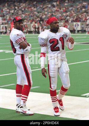 NFL FILE: Jerry Rice (80) and Steve Young (8) of the San Francisco 49ers  during Super Bowl XXIX at Joe Robbie Stadium in Miami, Florida. Young threw  a record 6 touchdowns and