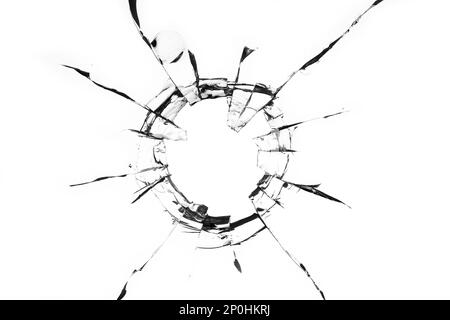 Impact point of bullet in cracked and fragmented glass surface Stock ...