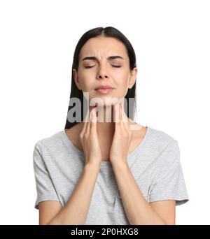 Young woman doing thyroid self examination on white background Stock Photo