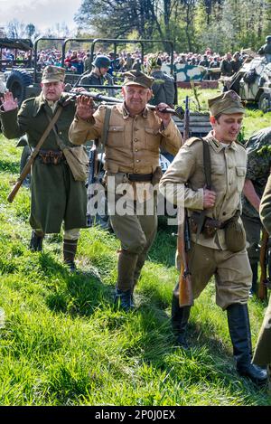 Reenactors in uniforms of Polish military, at reenactment of WW2 battle, Jelenia Gora, Lower Silesia, Poland Stock Photo