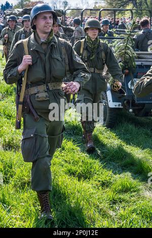 Reenactors in uniforms of US troops, at reenactment of WW2 battle, Jelenia Gora, Lower Silesia, Poland Stock Photo