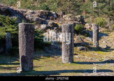 Granite roman milestones in Via XVIII, Roman road between Braga and Astorga. Baixa Limia-Serra do Xures Natural Park Galicia, Spain Stock Photo