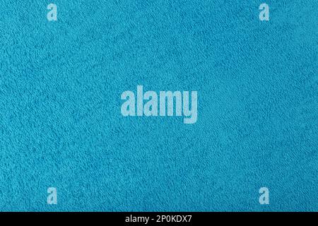 Clean light blue beach towel as background, closeup Stock Photo