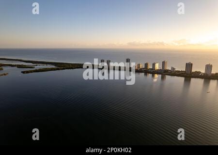 An aerial view of luxury condominium towers surrounded by waters on Riviera Beach in North Palm Beach Stock Photo