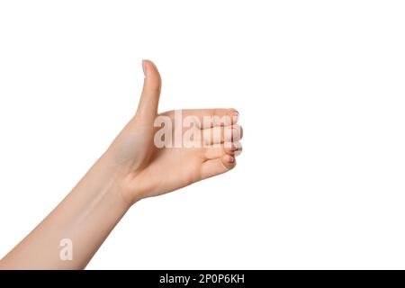 Woman hand holding something like a bottle or glass, isolated. Empty hands. Stock Photo