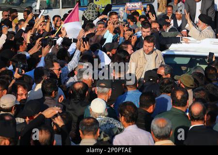 Bushehr, Bushehr, Iran. 2nd Mar, 2023. This handout picture provided by the Iranian presidency shows President EBRAHIM RAISI greeted by crowds in Bushehr, Iran. Stating that the enemy does not want the Iranian nation to live independently, freely, with strong will and cohesion, the President said, The enemy has always tried to stop or at least slow down the Iranian nation's rapid movement with Imposed War, sedition of hypocrites, and malicious threats and sanctions. Still, it has not succeeded and will not succeed. (Credit Image: © Iranian Presidency via ZUMA Press Wire) EDITORIAL USAGE ONLY! Stock Photo