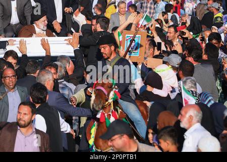 Bushehr, Bushehr, Iran. 2nd Mar, 2023. This handout picture provided by the Iranian presidency shows President EBRAHIM RAISI greeted by crowds in Bushehr, Iran. Stating that the enemy does not want the Iranian nation to live independently, freely, with strong will and cohesion, the President said, The enemy has always tried to stop or at least slow down the Iranian nation's rapid movement with Imposed War, sedition of hypocrites, and malicious threats and sanctions. Still, it has not succeeded and will not succeed. (Credit Image: © Iranian Presidency via ZUMA Press Wire) EDITORIAL USAGE ONLY! Stock Photo