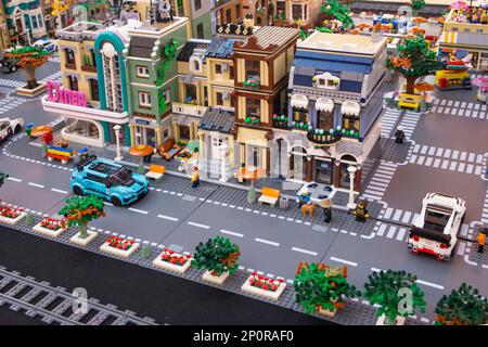 Urban scene with busy street and vintage buildings made from lego blocks at a mall exibition Stock Photo