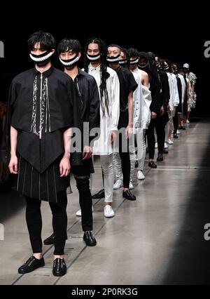 Masked models present the ACUOD by CHANU collection at the Amazon