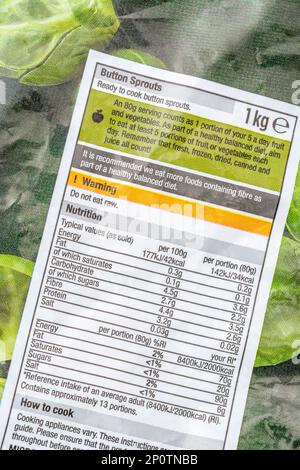 Close shot of Morrison's own-label frozen sprouts packet with nutrition / dietary information label in a boxout. For own-label branded veggies in UK. Stock Photo