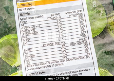 Close shot of Morrison's own-label frozen sprouts packet with nutrition / dietary information label in a boxout. For own-label branded veggies in UK. Stock Photo