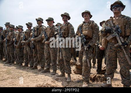 U.S. Marines with painted faces participate in an amphibious assault exercise as part of the Cobra Gold 2023 joint military exercise at the military base in Sattahip, Chonburi. The Cobra Gold exercise is the largest joint multilateral military exercise in Southeast Asia, co-hosted annually in Thailand by the Royal Thai Armed Forces (RTARF) and the U.S. Indo-Pacific Command. The Cobra Gold 2023 on this year's the 42nd iteration with seven fully participating countries ñ Thailand, the United States, Singapore, Japan, Indonesia, the Republic of Korea, and Malaysia. Stock Photo