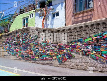 Busan, South Korea - May 2019: Famous busan gamcheon culture village colourful fish shaped mural art Stock Photo