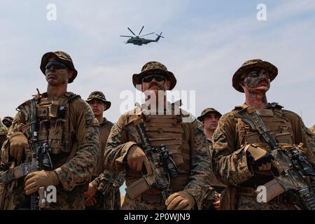 US marines seen posing for photo during the joint military exercise on Hat Yao beach in Chonburi, Thailand. The amphibious exercise is the highlight of the Cobra Gold 2023 which located in Sattahip district, Chonburi province, Thailand aimed to build the capacity of participating military forces during allied joint operations. The Cobra Gold exercise is the largest joint multilateral military exercise in Southeast Asia, co-hosted annually in Thailand by the Royal Thai Armed Forces (RTARF) and the U.S. Indo-Pacific Command. The objectives of the exercise are to develop good military relations Stock Photo