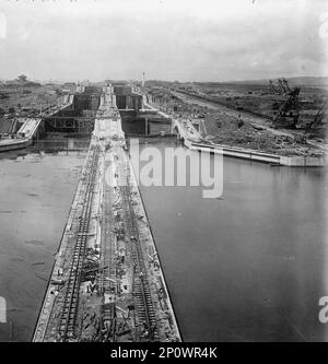 General view from temporary tower on north end of approach wall looking south, Sea Gates Under Pressure, July 18, 1913. Locks under construction, Panama Canal. Stock Photo