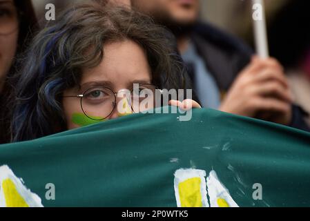 Rome, Italy. 03 march 2023. Close up of a protester with her face painted. Climate activists held a demonstration organized by Fridays For Future, as part of the Global Climate Strike calling for action against climate change. Stock Photo