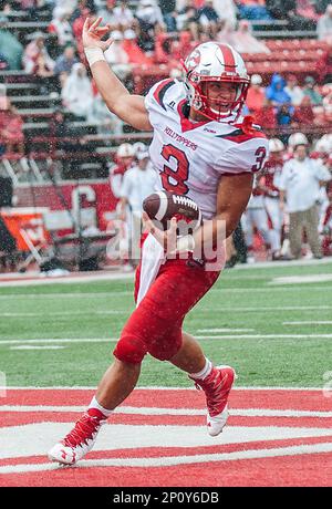 Miami Ohio running back Austin Sykes (29) is brought down by Akron  defensive back Davanzo Tate (5) in the first quarter during their football  game Wednesday, Nov. 14, 2007, in Oxford, Ohio. (