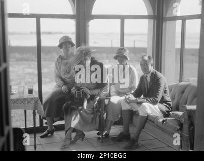 Slater, Mrs., and friends in a house in Long Beach, 1924 July. Stock Photo