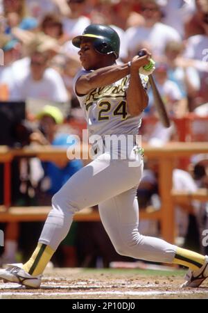 Oakland A's Rickey Henderson (24) during a game from his 1992 season with  the Oakland A's. Rickey Henderson played for 25 years with 9 different teams,  was a 10-time All-Star was inducted