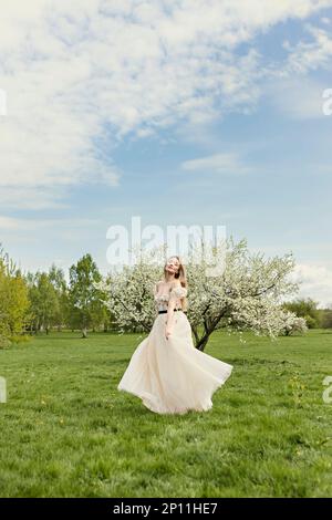 Free Photos - An Attractive Woman Wearing A Stunning White Dress, Which  Appears To Be A Wedding Dress, As She Poses In Front Of A Window. She Is  Turning And Twirling Around,