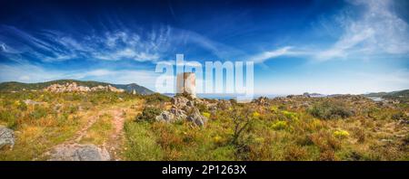 Budello tower, ancient watchtower, in Porto Budello Teulada, panoramic view on spring. Stock Photo