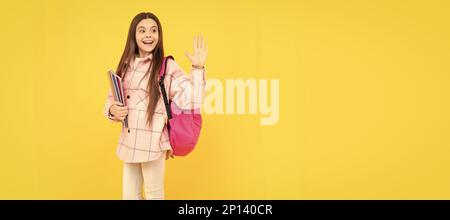 back to school. hello or goodbuy. teen girl in checkered shirt. happy kid waving hand. Portrait of schoolgirl student, studio banner header. School Stock Photo