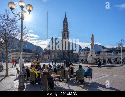 Cafe on Waltherplatz (Piazza Walther) with the Cathedral behind, Bolzano, Italy (Bozen) Stock Photo