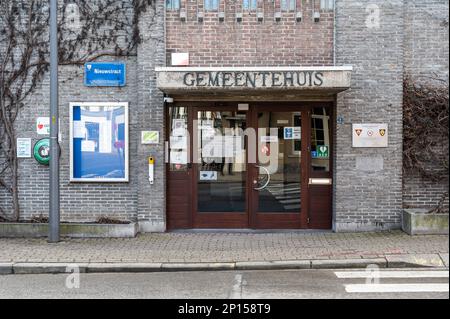 Merchtem, Flemish Brabant Region, Belgium, Feb. 25 2023 - Facade and entrance of the administrative building of the city hall Stock Photo