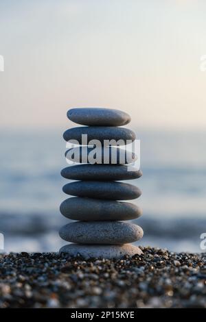 Pebble stones on nature bokeh background - SPA Concept Stock Photo - Alamy