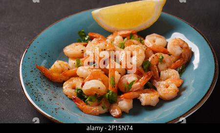 Homemade Sauteed Shrimps with Herbs and Lemon Stock Photo