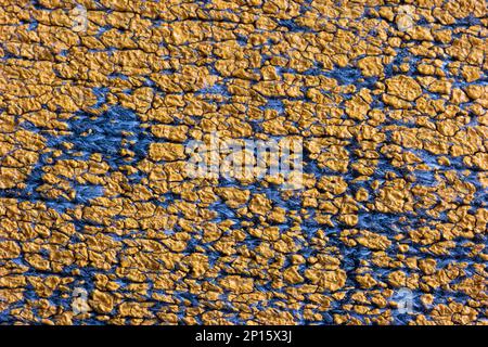 Old gray cloth fabric macro shot with peeling paint degrading. Stock Photo