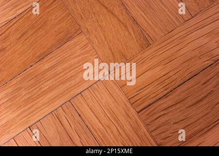 Old hard wood floor tiles texture background macro close up shot top view. Stock Photo