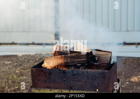 Prepare Grilling Charcoal Heat Flame For Roasting Meat.Sparking Fire In Grill On Cooking. Kindling Coals Flames In Mangal Barbecue Stock Photo