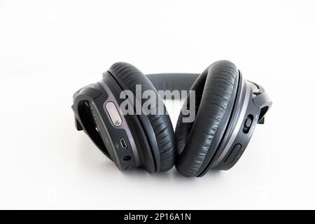 Generic black Bluetooth wireless headphone isolated on white background. Stock Photo